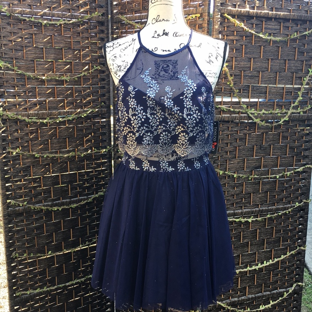 NEW Tease me brand  👗 size 7.  Look stunning in this shimmering blue dress